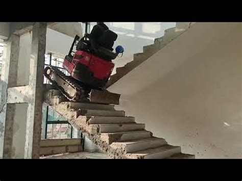 mini excavator climbing stairs|How Mini Excavators Are Able to Climb Stairs Without Causing.